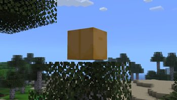 Imagem oficial da galeria do Verity JE mostrando a caixa de Verity flutuando em um mundo do Minecraft durante o dia